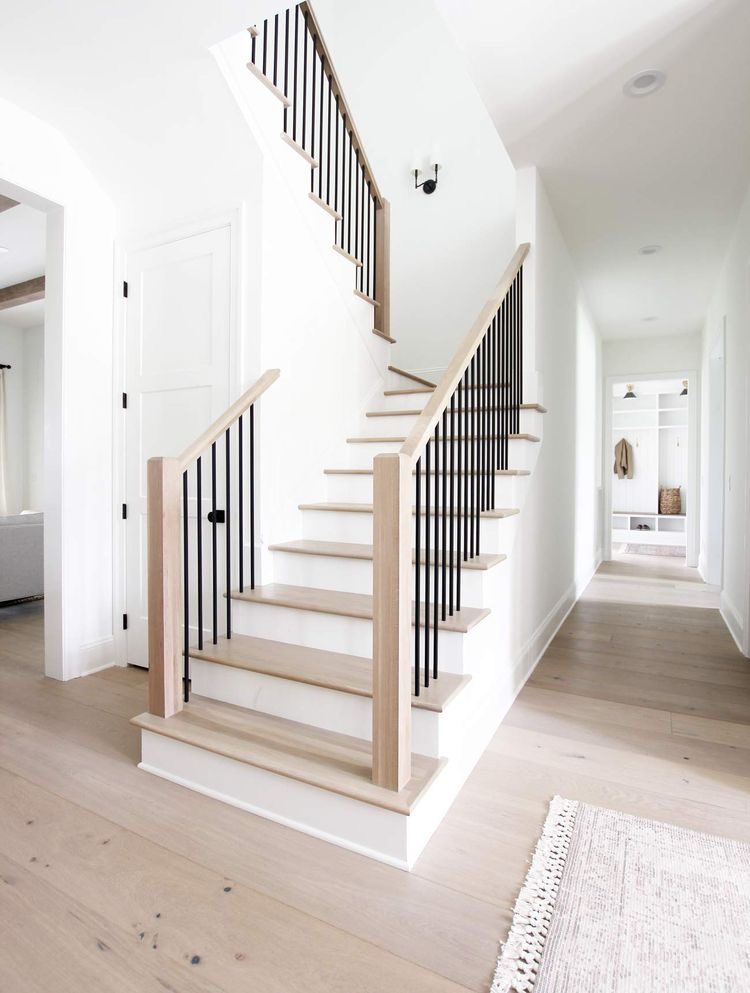 Newel Posts custom fabricated from your flooring by Voda Stairs in Seattle