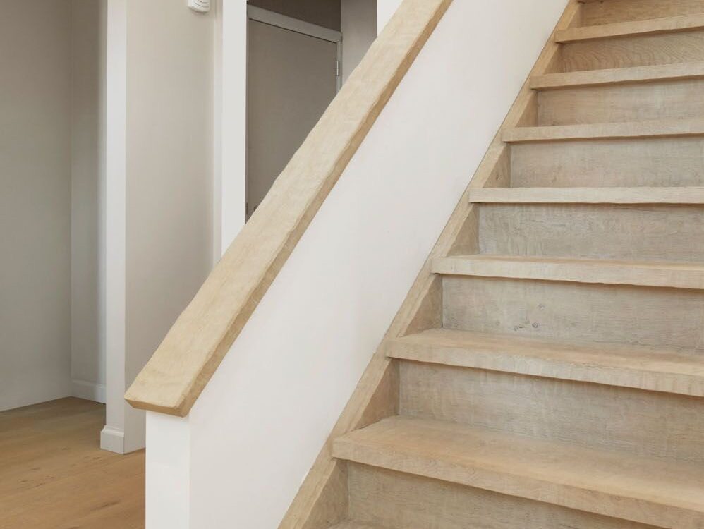 Squared Wallcaps custom fabricated from your flooring by Voda Stairs in Seattle