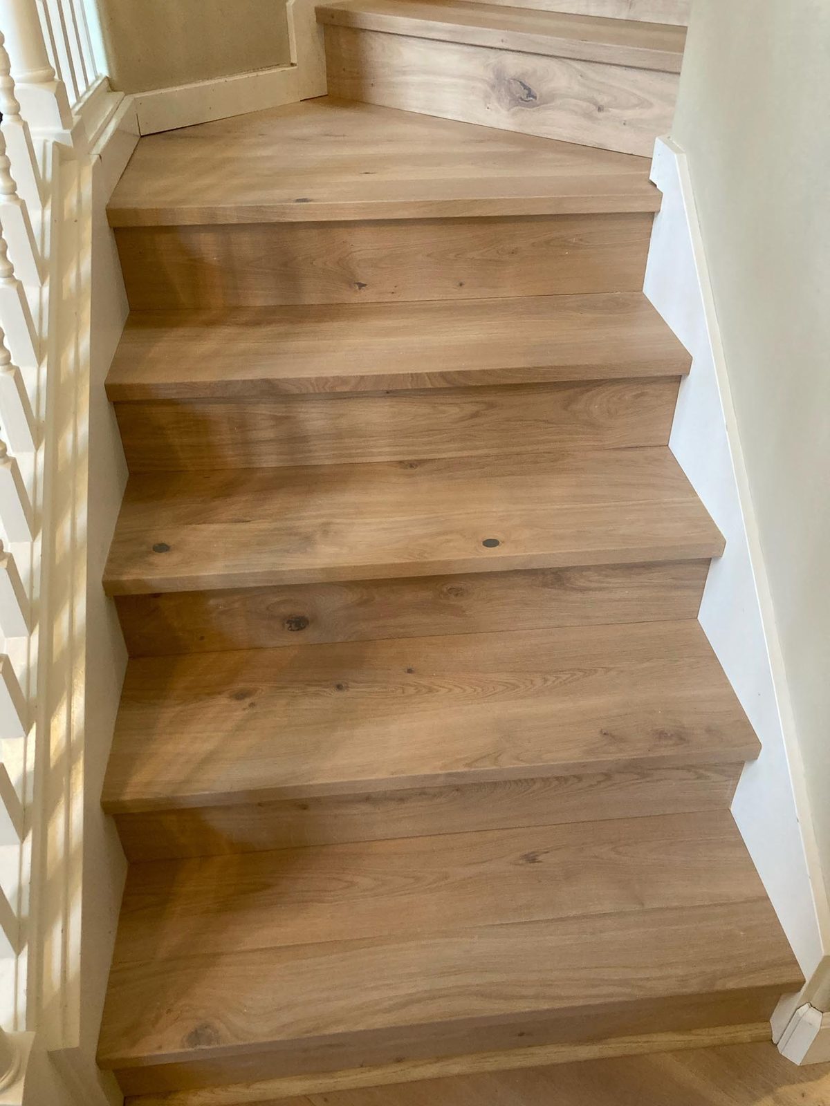 Square Style Trim custom fabricated from your flooring by Voda Stairs in Seattle