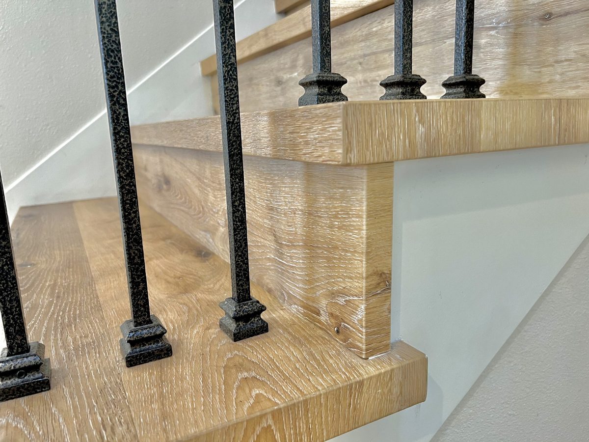 Return Risers custom fabricated from your flooring by Voda Stairs in Seattle