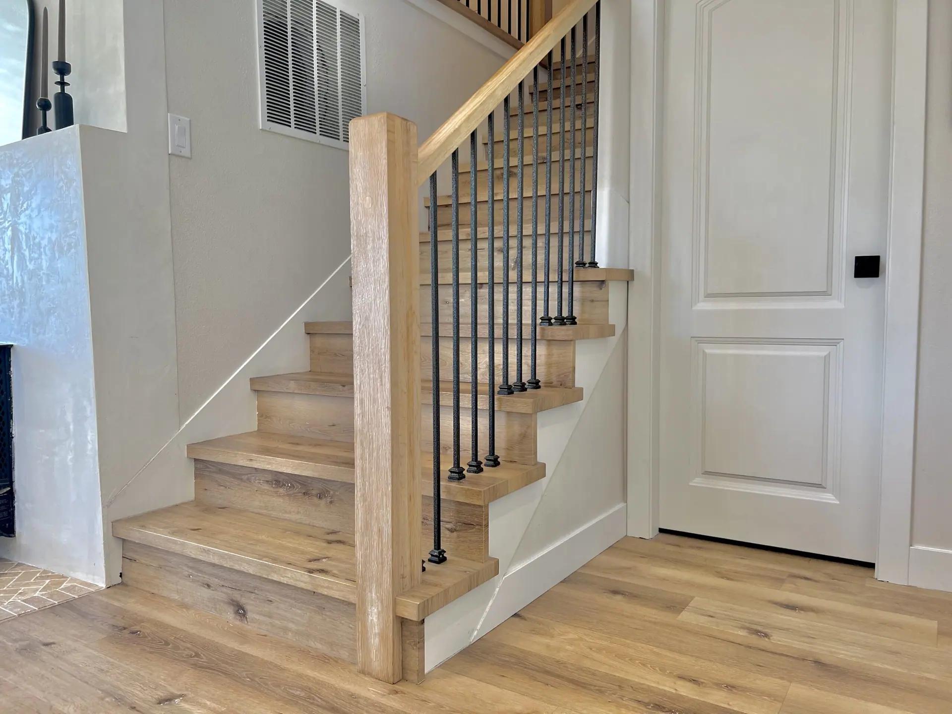 Newel Posts custom fabricated from your flooring by Voda Stairs in Seattle